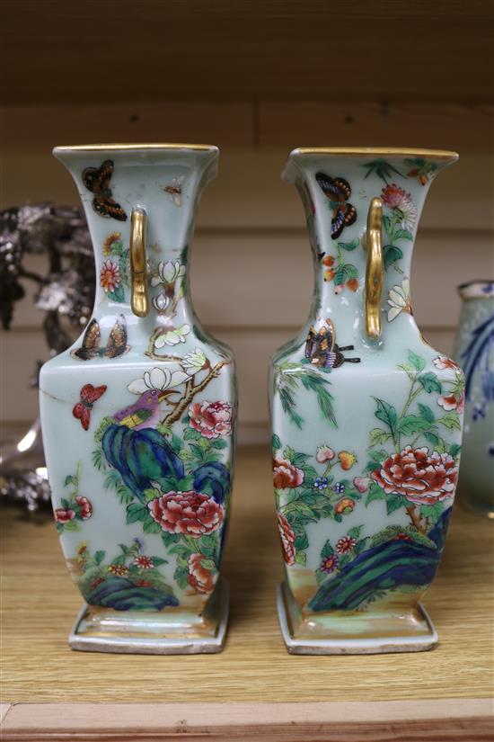 Two famille verte vases, two blue and white Chinese vases, a dish and a carved stand